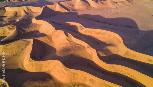 Fototapeta Naklejka Na Ścianę i Meble -  Aerial View of Textured Beige Sand Dunes in a Desert