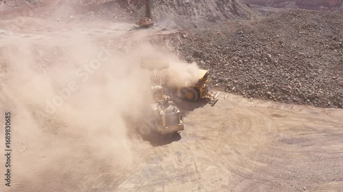 Mining Haul Trucks Operating and Loading in Open Pit Mine Chile