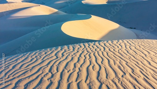 Fototapeta Naklejka Na Ścianę i Meble -  Aerial View of Beige Sand Dunes with Wavelike Ripples