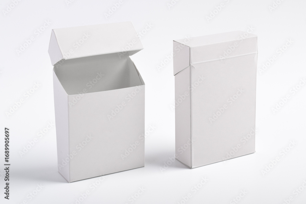 Front and back view of cigarette boxes or packs isolated on a white background. Clipping path. Template for your design. Front and back view of cigarette boxes or packs isolated on a white background. Clipping path. Template for your design.