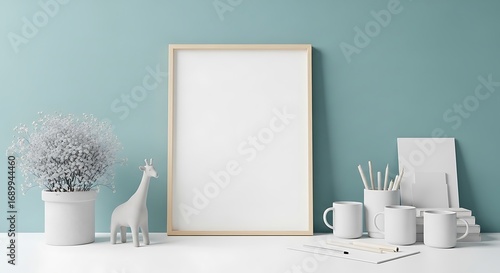 Minimalist Workspace with Blank Frame and Decorative Items.