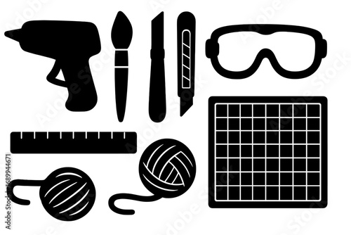 Crafting tools icon set. Silhouette collection for DIY projects. Includes hot glue gun, paintbrush, cutter, safety goggles, ruler, yarn, and cutting mat for handmade hobbies.