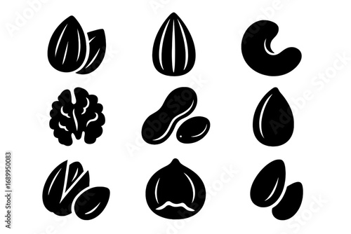 Nut and seed icon set. Black silhouette collection of healthy food symbols. Vector graphic illustration of almond, walnut, peanut, pistachio and cashew. Vegan organic snacks.