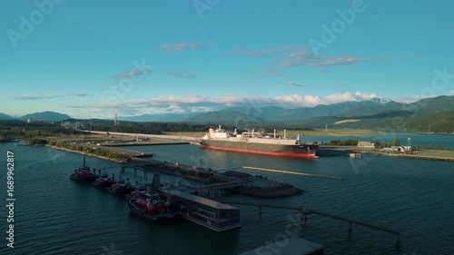 A LNG ship sits at port as it is loaded with liquified natural gas in Kitimat, British Columbia