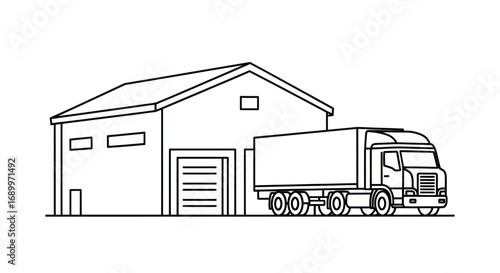 Warehouse building with a delivery truck parked at the loading dock.