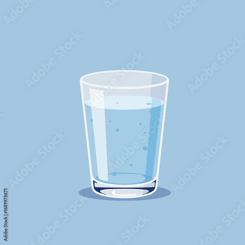 A clear glass filled with water against a light blue background.
