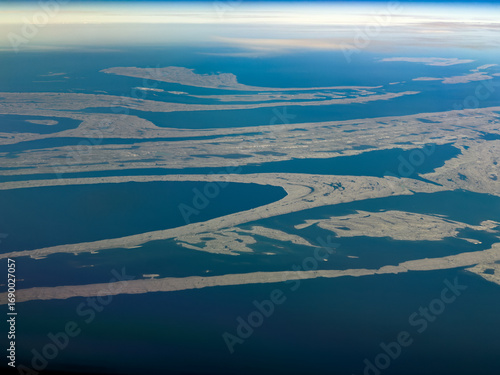 aerial landscape view of Belcher Islands group with Flaherty Island, the largest island of the Belcher Islands group located in Hudson Bay, Qikiqtaaluk Region, Nunavut, Canada 