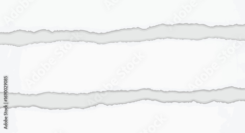 Two torn pieces of white paper reveal a grey background, creating a visual separation.
