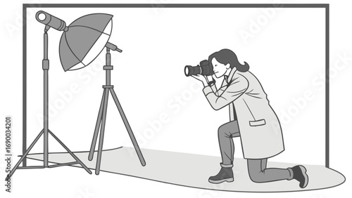 Photographer Kneeling Taking Photo in Studio with Lighting Equipment.