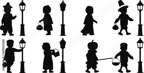 Silhouettes of Children in Costume Holding Buckets Next to Lampposts trick or treat