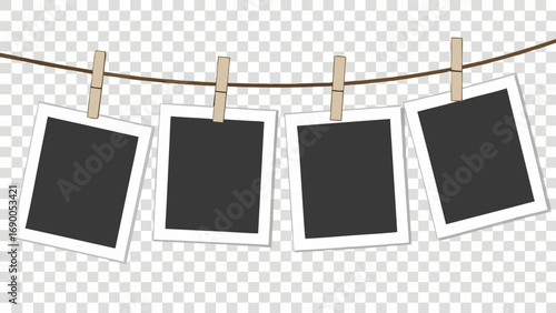 Four blank photo frames hanging on a clothesline with clothespins mockup template for design.