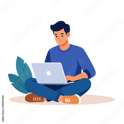 Person using laptop, seated on floor.