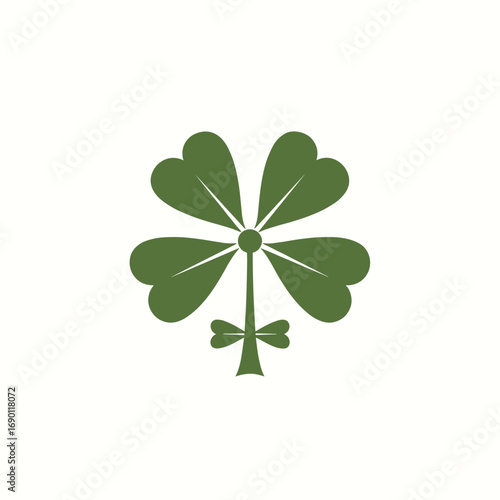 A minimalist green shamrock leaf symbol with a bow at the stem against a plain white background representing good luck and irish heritage