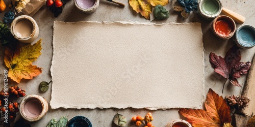 A Vibrant Artistic Arrangement of Paints and Nature's Bounty Surrounding a Blank Canvas Ready for Creative Expression