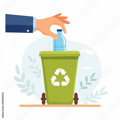 Hand Disposing Plastic Bottle In Recycling Bin