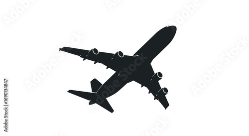 Large passenger airplane silhouette with four engines flying.