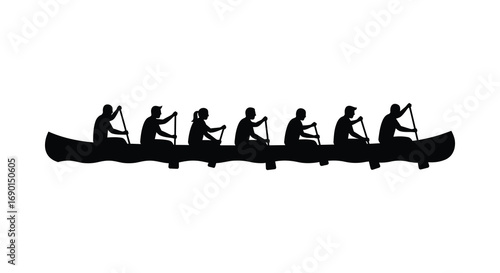 a group of people paddling together in a canoe