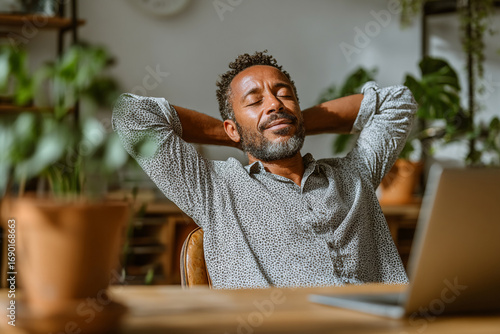 deep breath business : Relaxed businessman taking a deep breath, inished work sitting at desk enjoying stress free job breathing fresh air, mental health, self care or meditation