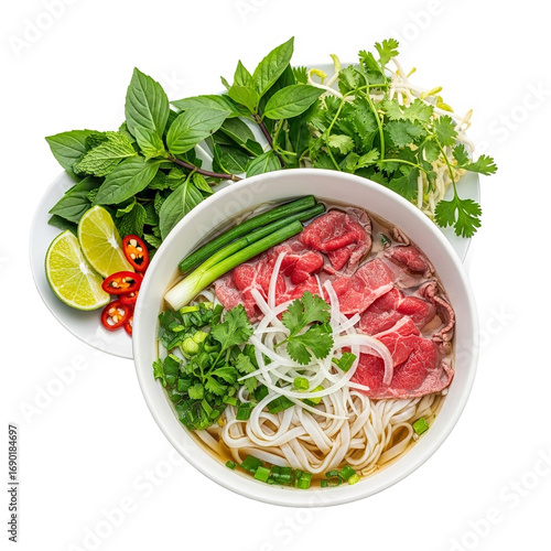 Photo of a bowl of vietnamese pho noodle soup with thinly sliced beef, fresh herbs, lime, and chili, isolated on a transparent background
