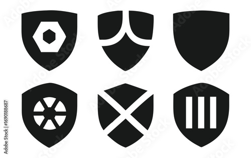 Six diverse shield emblems featuring geometric and abstract designs for heraldry and gaming