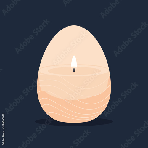 A beautiful egg shaped candle with a gentle flame flickering softly in the dark providing a warm and cozy ambiance for relaxation and tranquility