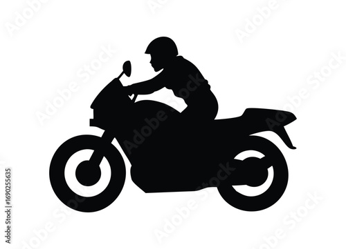 Silhouette of a rider on a sport motorcycle in motion