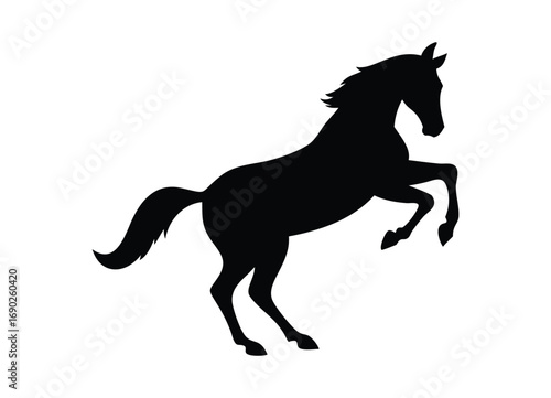 Dynamic black silhouette of a powerful horse rearing up in motion
