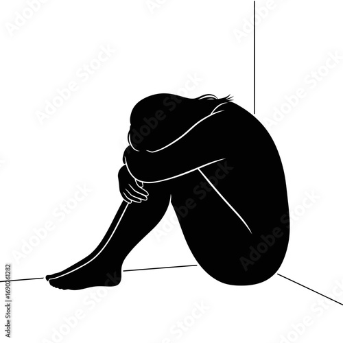 Silhouette of a Sad Woman Sitting Alone in a Corner