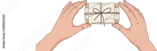 Hands holding a wrapped package tied with string