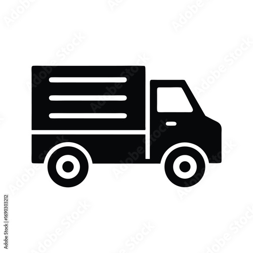 A small black transport delivery truck moves forward efficiently