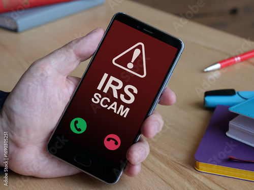 Photos IRS Scam call is shown as business and financial concept
