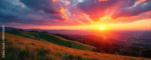Serene sunset over rolling hills, vibrant colors painting the sky Golden hour light bathes the landscape in warmth, creating a breathtaking vista , evening, landscape