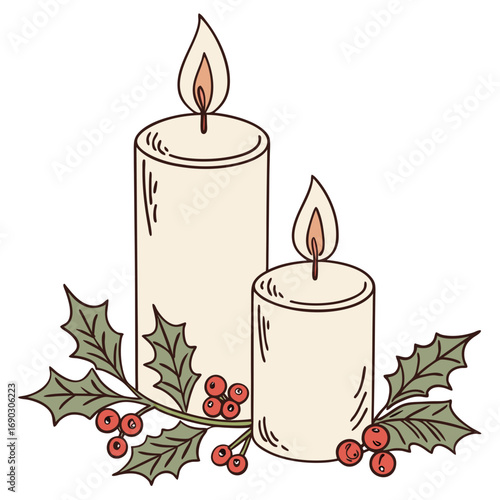 Two lit cream colored candles surrounded by festive holly branches with red berries on a white background