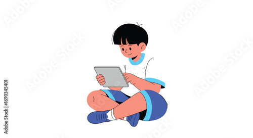 Young boy happily engrossed using a digital tablet while sitting cross-legged, embracing modern technology