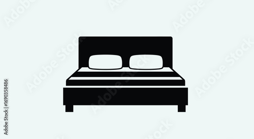 Black and white bed with pillows
