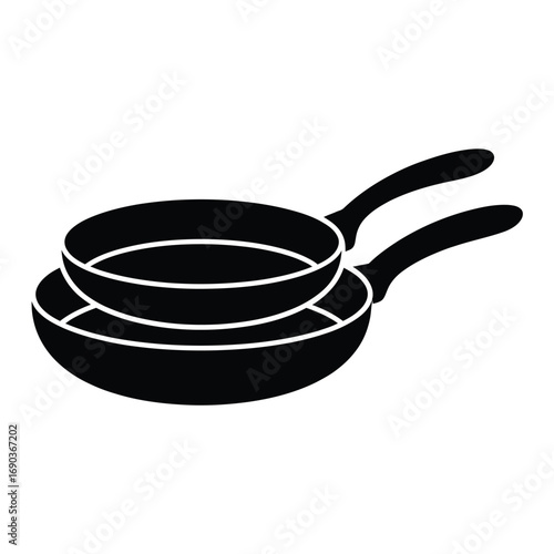 Two black frying pans stacked for cooking and kitchen use