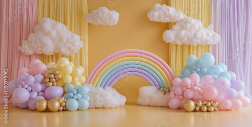 backdrop composition a blue sky with white clouds in the background, a rainbow-colored balloon arch garland,