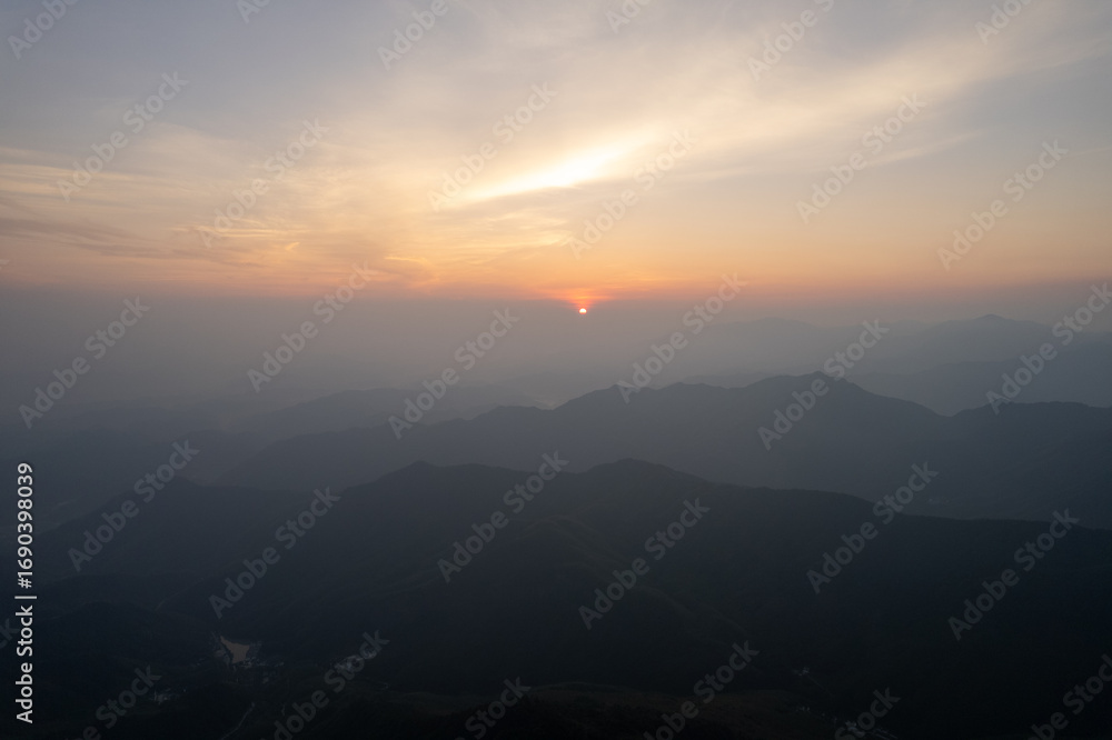 Fototapeta premium Mountain sunset view over Jiugong Mountain China.