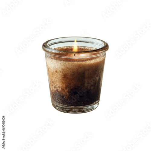 Lit Brown Scented Candle in Glass Jar on Black Background