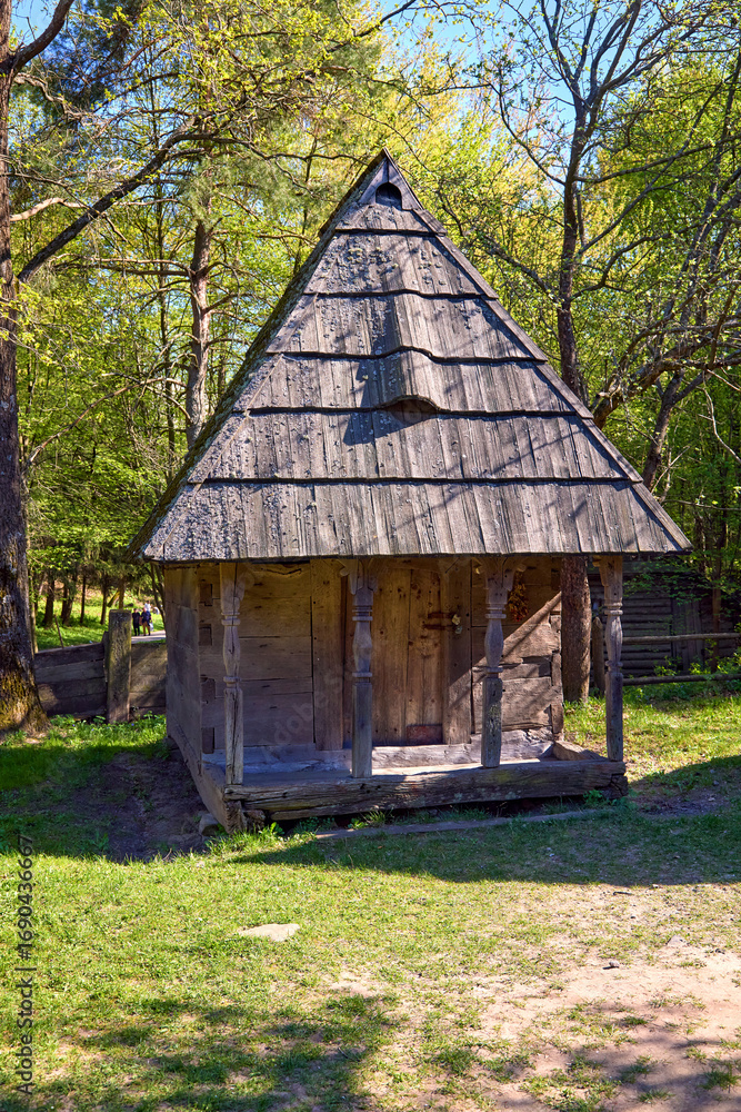 Fototapeta premium old wooden hut in the forest