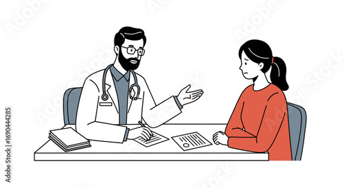 A male doctor with a beard and stethoscope is consulting with a female patient at a desk.