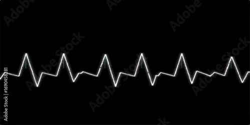 A bright red cardiogram illustrates a beating heart on a medical monitor