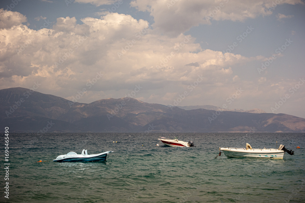 Fototapeta premium Three boats await the bad weather
