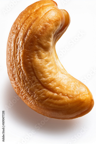 Curved cashew nut promoting plant-based protein and sustainable food awareness
Roasted cashew with central groove inspiring conscious food consumption habits
