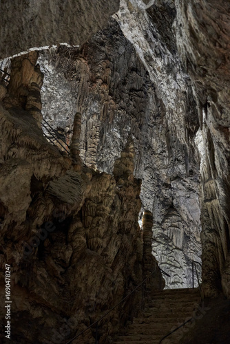 The Artá ​​Caves, overlooking a cliff and with an imposing entrance, are filled with stalactites and stalagmites. One of the stalagmites is 22 meters high. Located in Cap Vermell, Mallorca, Spain.
