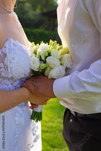 Wedding bouquet, wedding, bride, groom, wedding photo, bouquet in hand, wedding bouquet in hand, white rose bouquet, wedding ceremony
