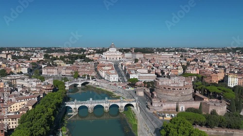 Aerial view of Rome showing the Tiber River winding through the city of ancient architecture. View of the city from above. Travelling through beautiful places of Rome. High quality footage in 4k forma