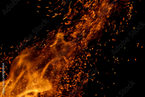 A fire is burning and the smoke is flying in the air