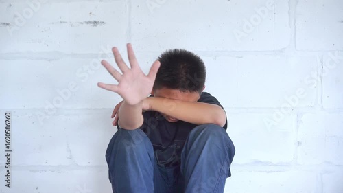 Stop abusing boy violence. child bondage , violence, terrified , A fearful child , Human Rights Day concept.