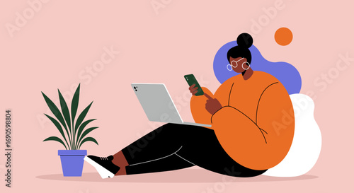 Person balancing remote work and digital communication with laptop and phone, embodying modern flexible lifestyle and productivity.